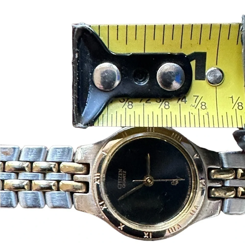 Citizen ladies two-tone black face watch with Roman numerals bezel